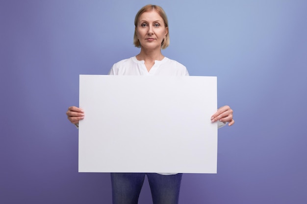 S woman holding blank white news paper with mocup