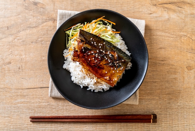 saba fish grilled with teriyaki sauce on topped rice bowl