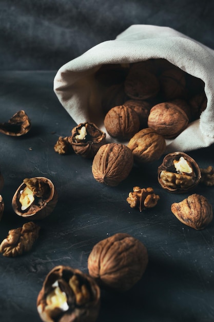 Sack of walnuts with copy space in dark mood shot