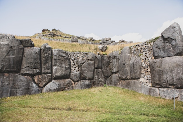 Sacsayhuaman fortress in Cusco Peru or Stone wall background