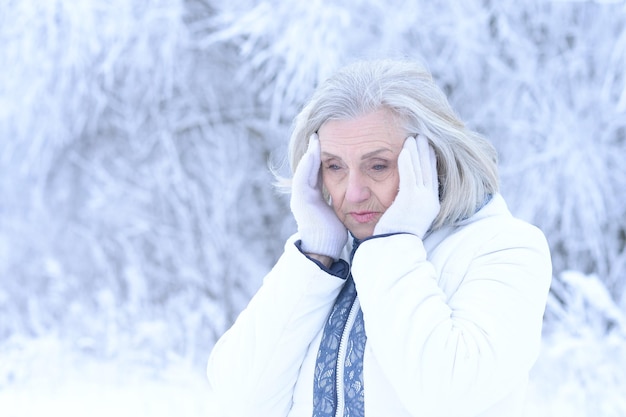 Sad beautiful senior woman