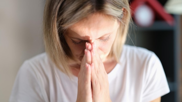 Sad depressed woman feeling bad crying hopelessly alone closeup