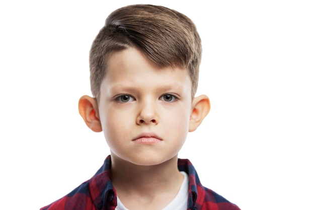 Sad lop-eared boy schoolboy. Close-up. Isolated on white .