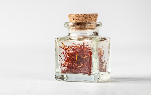 Saffron threads in glass veal close up