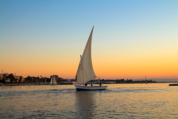 Sailboat at sunset in the Nile, Egypt