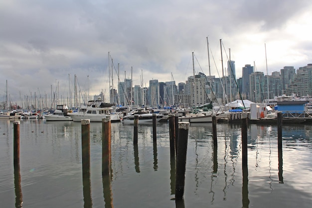 Sailing boats and Vancouver skyline British Columbia Canada