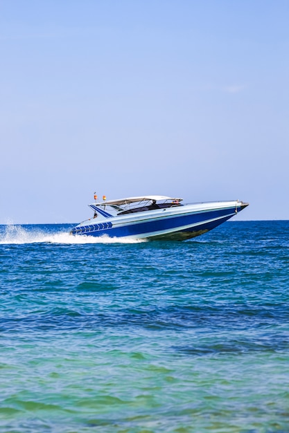 Sailing ship, speed boat, yacht on the sea