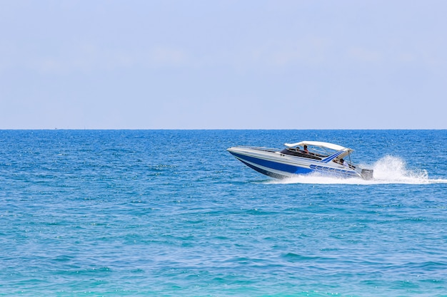 Sailing ship, speed boat, yacht on the sea