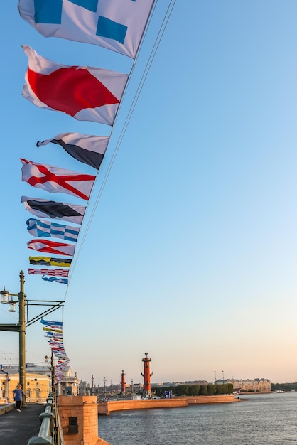 Saint Petersburg Russia International maritime signal flags are waving on wind under blue cloudy sky