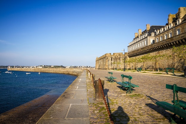 SaintMalo lighthouse and pier view from the city fortifications Brittany France