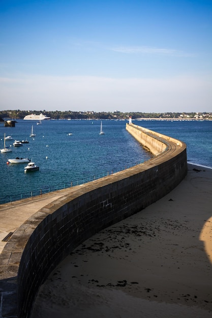 SaintMalo lighthouse and pier view from the city fortifications Brittany France