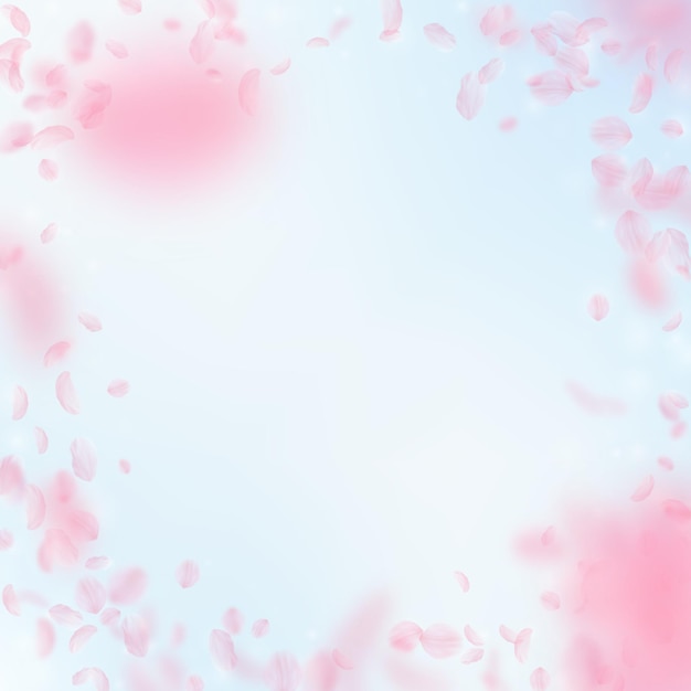 Sakura petals falling down. Romantic pink flowers vignette. Flying petals on blue sky square background. Love, romance concept. Decent wedding invitation.