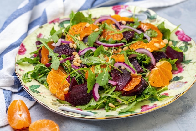 Salad of arugula baked beets and tangerines