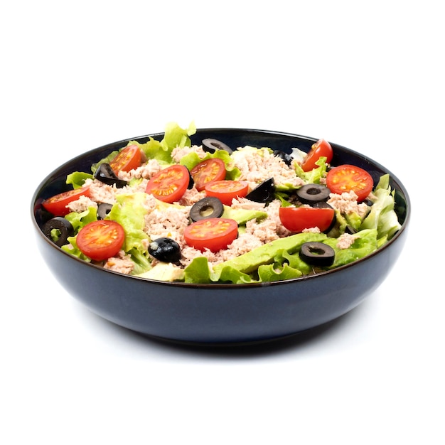 Salad avocado tuna tomatoes olive in a bowl on a white background  studio shot