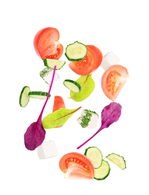 Salad of greens, cheese and radish on an isolated white background