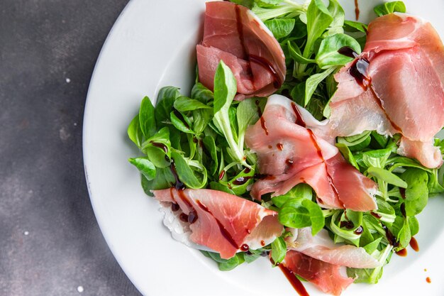 salad jamon aged meat ham fresh healthy meal food snack on the table copy space food background