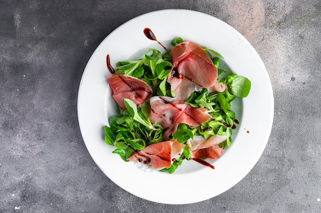 salad jamon ham meat fresh meal food snack on the table copy space food background rustic top view