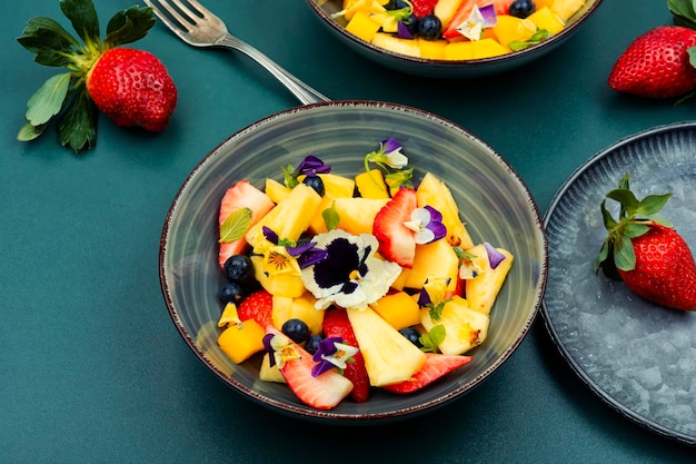 Salad of pansies and fruit