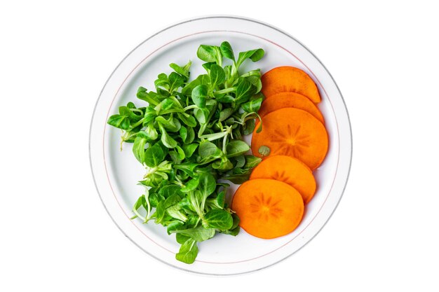 salad persimmon green lettuce fresh meal food snack on the table copy space food background rustic