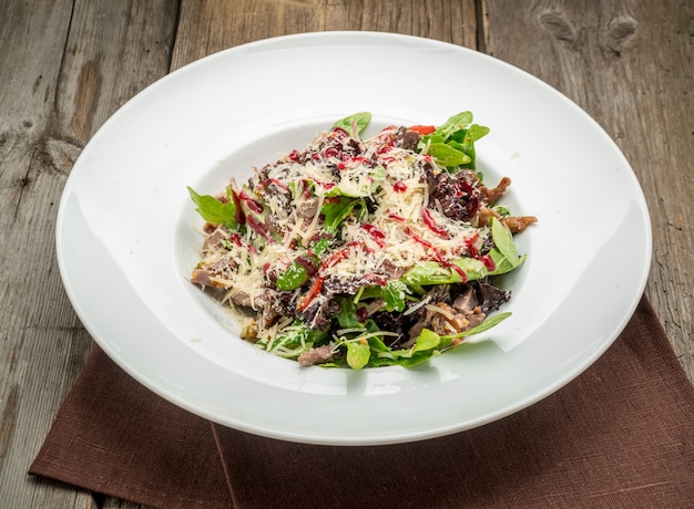 Salad of red pepper, arugula and fresh vegetables Healthy eating.