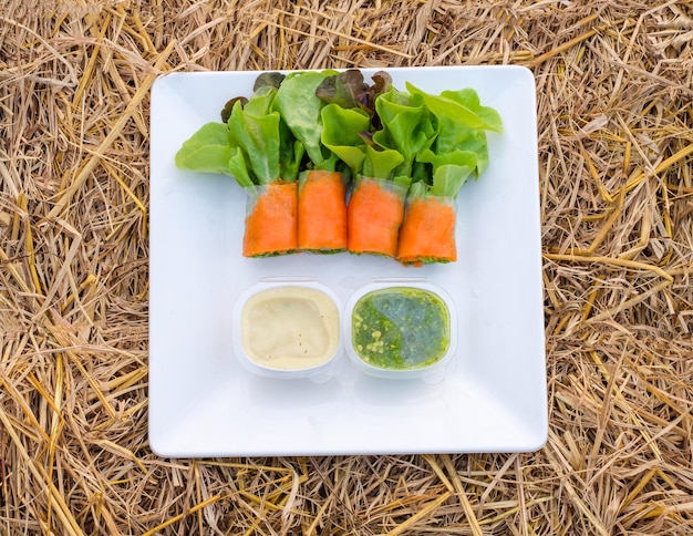 Salad roll green and red oak organic with filling tobiko flying fish and sauce