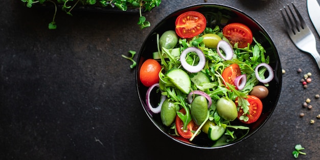 Salad vegetable olives tomato cucumber lettuce mix leaves snack meal