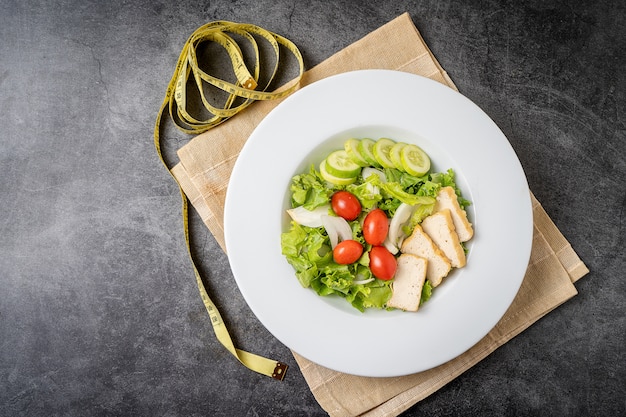 Salad. Vegetable salad, Fresh vegetable salad with tomatoes onion cucumber,.Top view, clean food concept