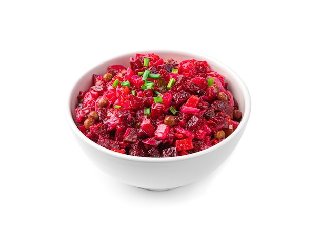 Salad vinaigrette with beetroot isolated on a white background. Traditional Russian salad. Side view.