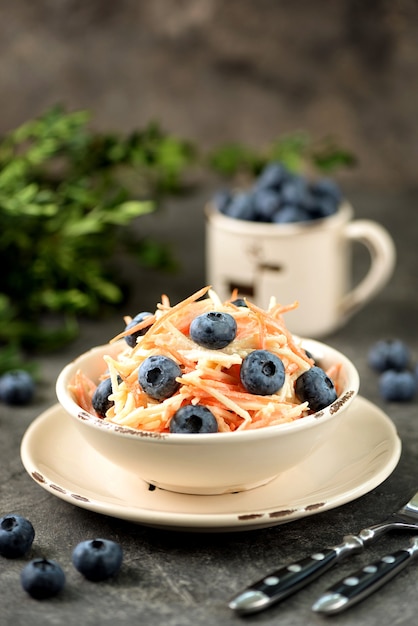 salad with apple carrot blueberry and yoghurt dressing