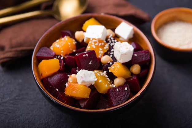 Salad with beet,  feta, and pumpkin,  keto ketogenic dash diet, modern surface , closeup