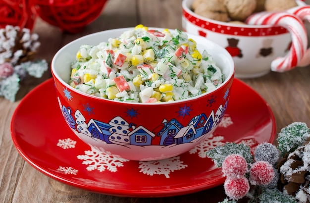 Salad with crab sticks, corn, cucumber, and rice