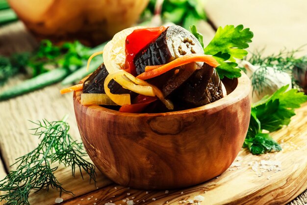 Salad with eggplant onions and bell peppers selective focus