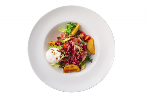 Salad with fried potato, red cabbage, mozzarella, bacon and tomato isolated on white