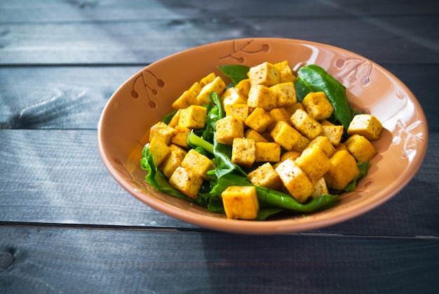 Salad with fried tofu and spinach