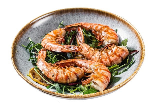 Salad with grilled Giant shrimps prawns in plate Isolated on white background