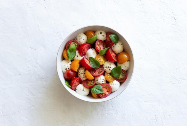 Salad with mozzarella tomatoes and basil Healthy eating Vegetarian food