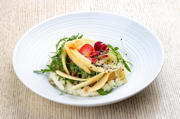 Salad with quinoa pear mini prawns and cheese mousse with herbs