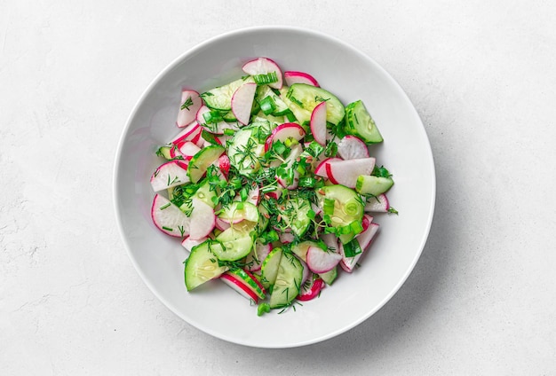 Salad with radish cucumber and herbs Vegetarian diet salad