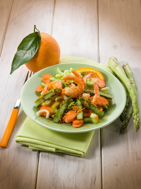 Salad with shrimp asparagus carrot and celery