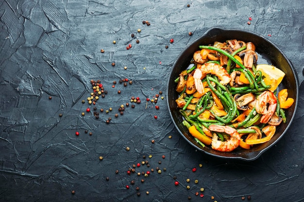 Salad with shrimps, asparagus beans and mushrooms.Copy space