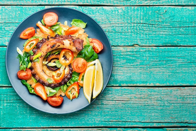 Salad with vegetables and octopus