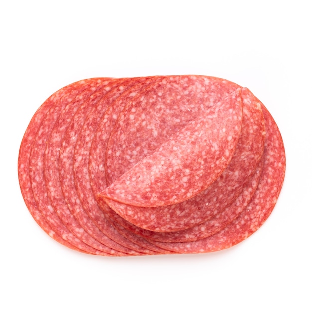 Salami slices on white surface.