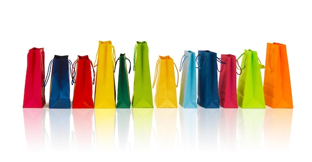 sale, consumerism, advertisement and retail concept - many colorful shopping bags