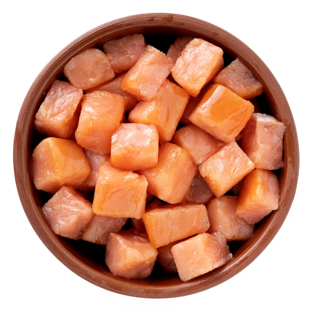 Salmon cut into cubes in a bowl