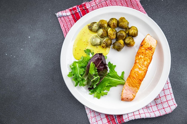 salmon fried and Brussels sprout second course meal food snack on the table copy space food