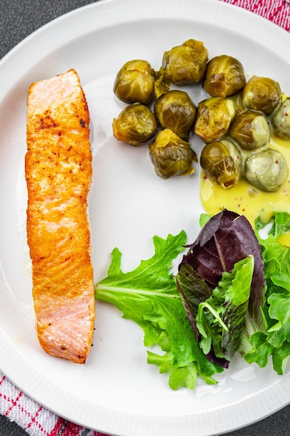 salmon fried and Brussels sprout second course meal food snack on the table copy space food