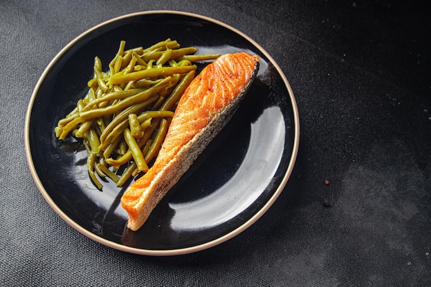 salmon fried fish and green bean meal food snack diet on the table copy space food background