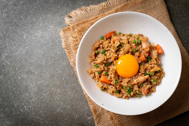 salmon fried rice with pickled egg on top - Asian food style