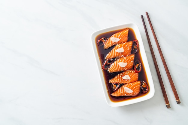 Salmon marinated shoyu or salmon pickled soy sauce in Korean style