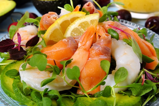 Salmon and prawn summer salad close up